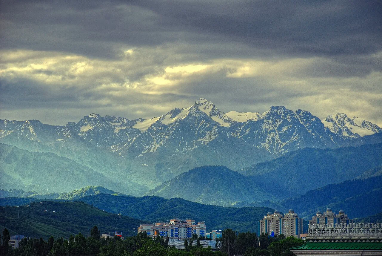 Morning view of Almaty and the Tian Shan mountains, illustrating the Central Asian market context
